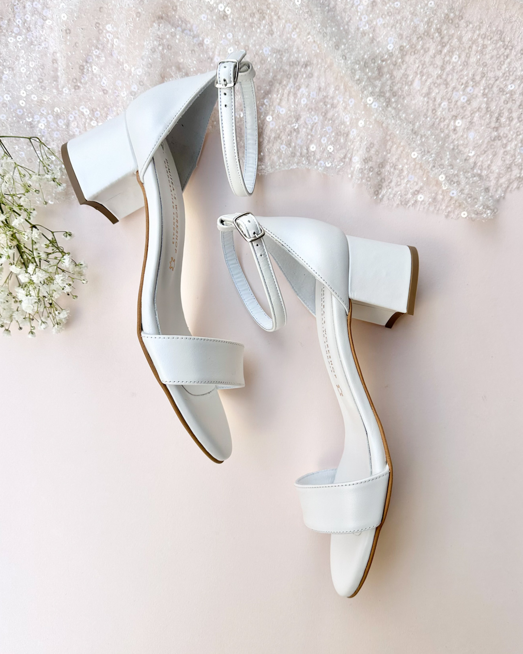 Simply chic white low heel